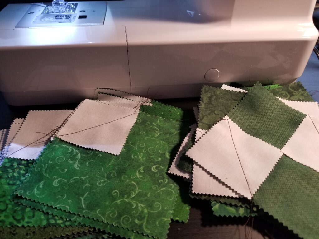 Green and white fabric sewn together.