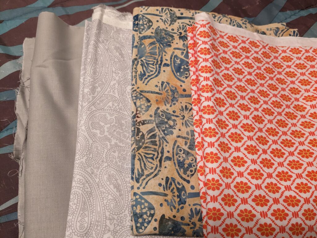 Four fabrics I purchased as part of my latest fabric haul.