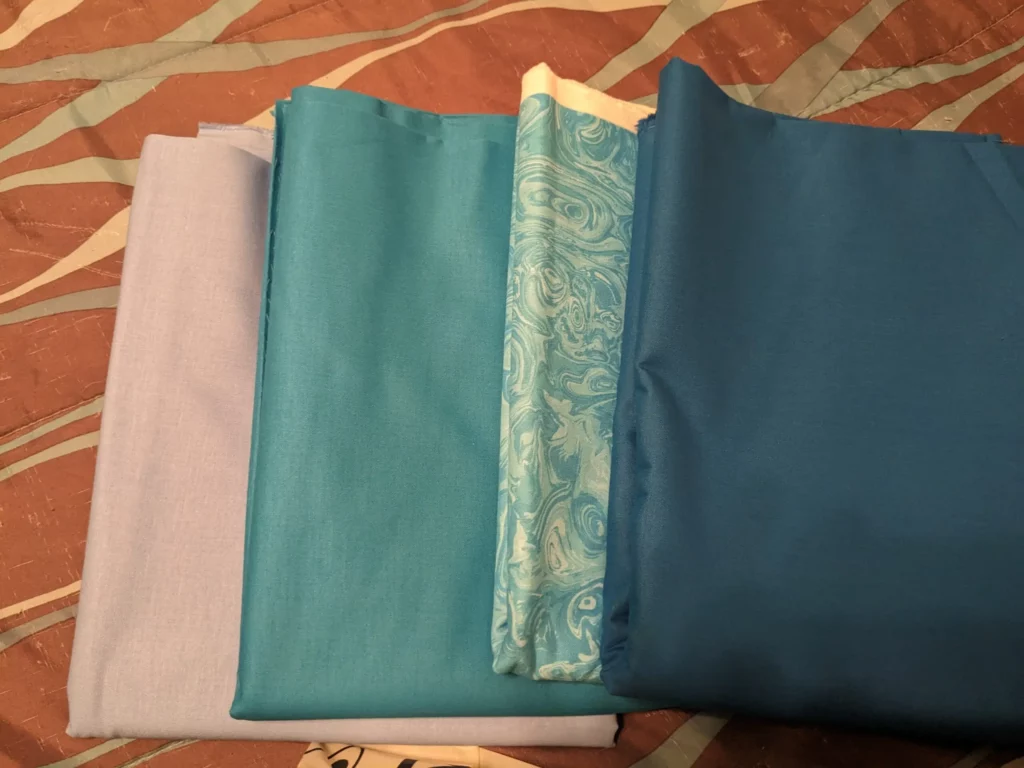 Four fabrics I purchased as part of my latest fabric haul.