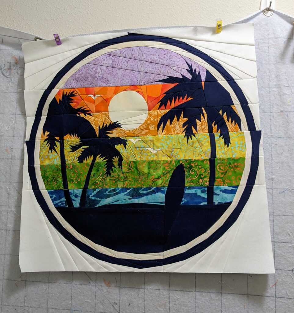 The completed Oceanside pattern with the papers still in, hanging from my design wall.