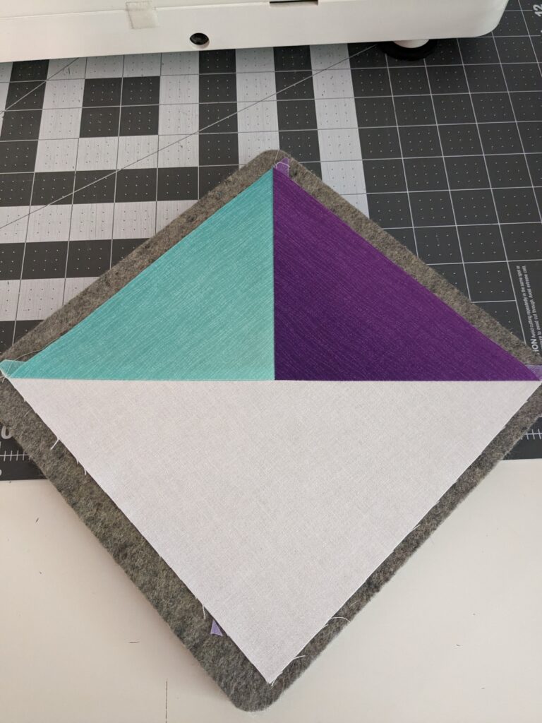Split quarter square triangle prior to trimming.