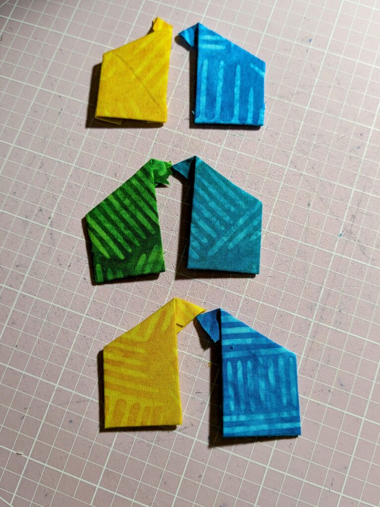 First basted half house pieces.