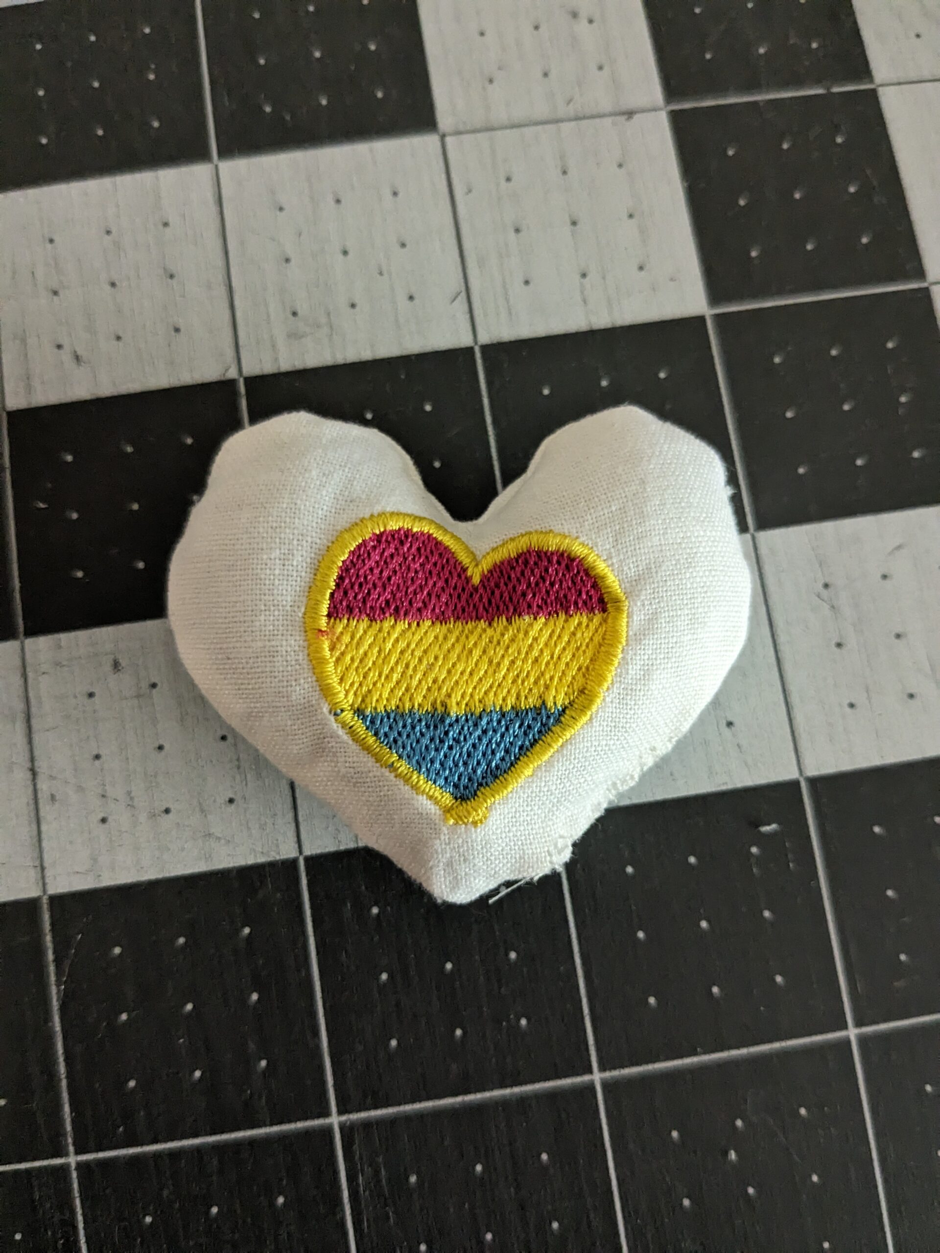 Spreading Love with Embroidered Pocket Hugs!